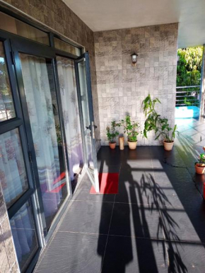 Enchanting Bungalow in Chemin Grenier with Jacuzzi and Garden